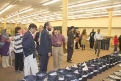 Container-send-off-Ceremony_Community-filling-AICB-buckets-10