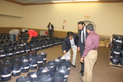 Container-send-off-Ceremony_Community-filling-AICB-buckets-8