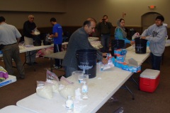 Alliance-volunteers-in-Houston-filling-AICB-buckets-for-flood-affected-families-in-Sinhd-Pakistan-2