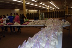 Alliance-volunteers-in-Houston-filling-AICB-buckets-for-flood-affected-families-in-Sinhd-Pakistan-3