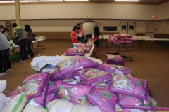 Alliance-volunteers-in-Houston-filling-AICB-buckets-for-flood-affected-families-in-Sinhd-Pakistan-4