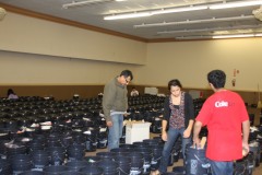 Container-send-off-Ceremony_Community-filling-AICB-buckets-135