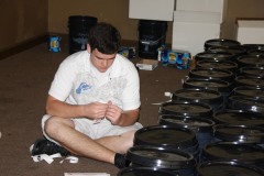 Container-send-off-Ceremony_Community-filling-AICB-buckets-3