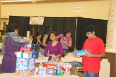 Container-send-off-Ceremony_Community-filling-AICB-buckets-5