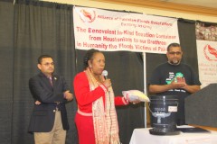 Container-send-off-Ceremony_Community-filling-AICB-buckets-83