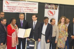 Container-send-off-Ceremony_Community-filling-AICB-buckets-89